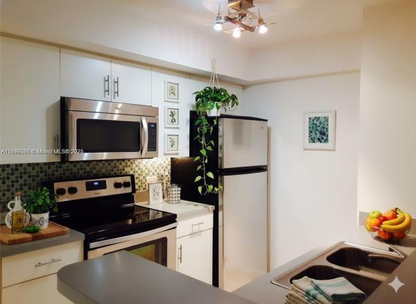 Devonaire At Pembroke Pines, 620 SW 111th Ave #104, Pembroke Pines, Florida 33025, image 1