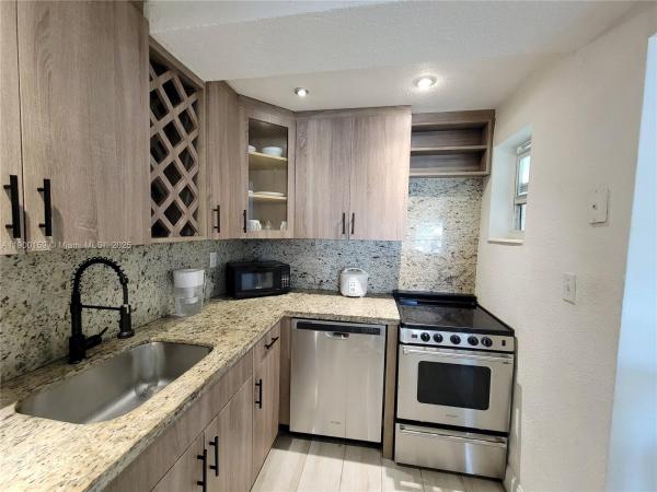 Monterey Gardens Of Pinecrest, 8609 SW 68th Ct #5, Pinecrest, Florida 33156, image 1