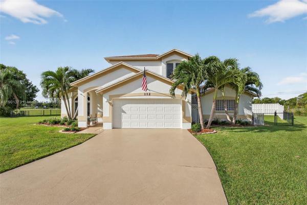 Crestwood, 112 Camelot Ct, Royal Palm Beach, Florida 33411, image 1