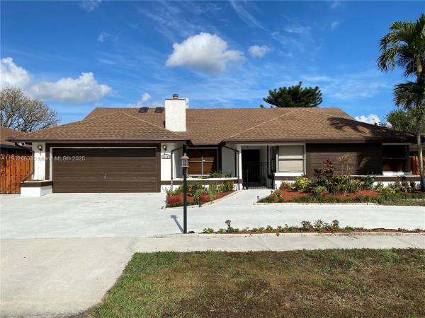 Sugar Pond Manor, 13647 Barberry Dr, Wellington, Florida 33414, image 1