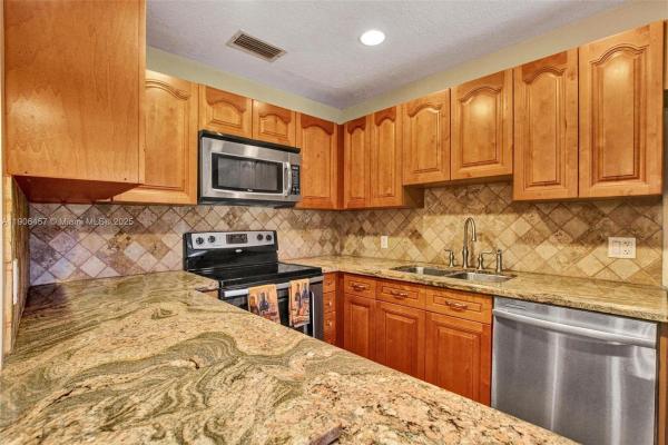 East Lakes Townhomes, 1590 NW 98th Ter, Pembroke Pines, Florida 33024, image 1