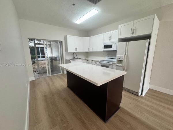 Las Brisas At Doral, 5630 NW 114th Path #106, Doral, Florida 33178, image 1