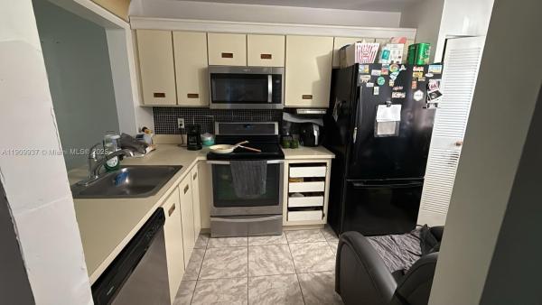 Monterey Village, 430 NE 210th Cir Ter #203-3, Ives Estates, Florida 33179, image 2