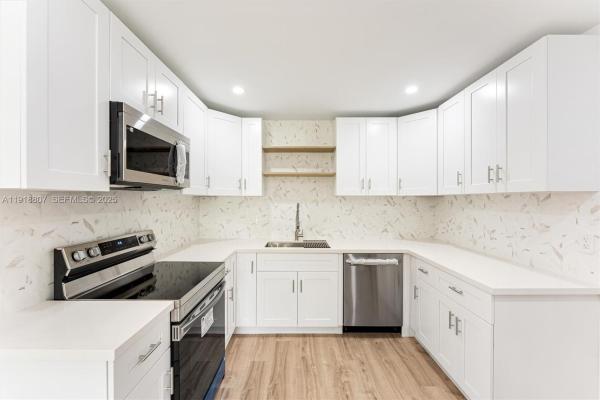 Sunrise Golf Village, 9720 NW 24th Pl #A, Sunrise, Florida 33322, image 1