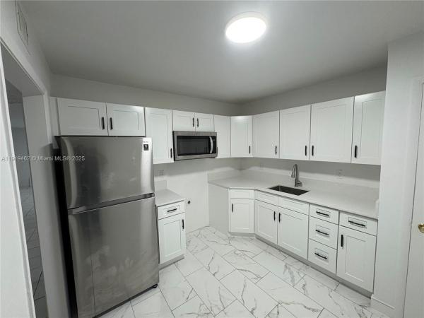 Castle Gardens, 4801 NW 22nd Ct #103, Lauderhill, Florida 33313, image 1