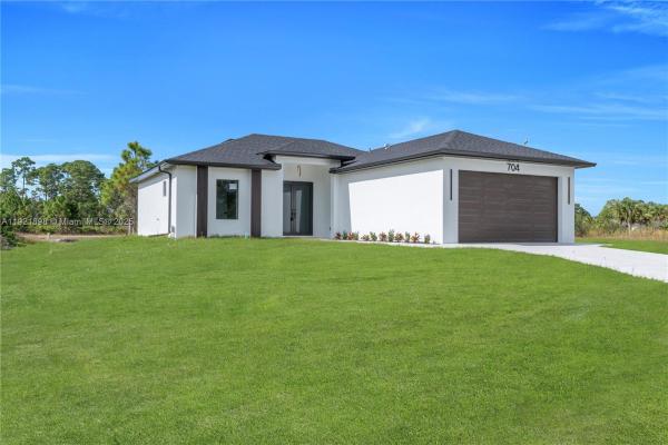 704 Holmes Ave, Lehigh Acres, Florida 33974, image 1