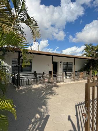 Sun Tan Village, 971 E 13th St, Hialeah, Florida 33010, image 1