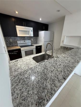 7075 NW 186th St #C409, Hialeah, Florida 33015, image 1