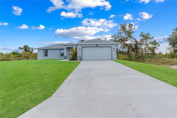 3117 W 64th W, Lehigh Acres, Florida 33971, image 1