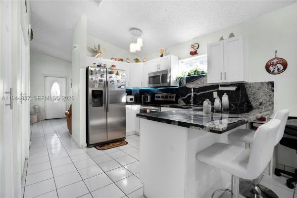 Polomo Homes, 7384 W 29th Ln, Hialeah, Florida 33018, image 1