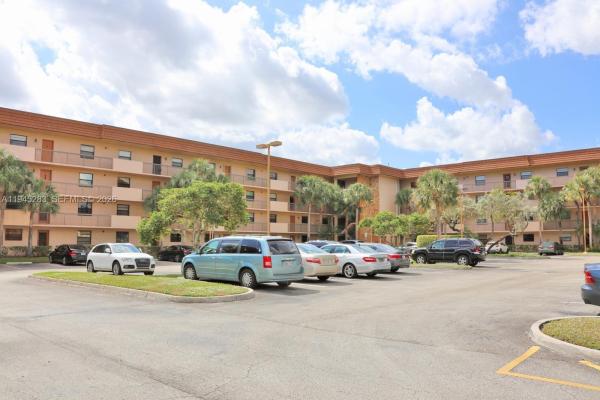 Lakes Of Carriage Hills, 4940 E Sabal Palm Blvd #203, Tamarac, Florida 33319, image 1