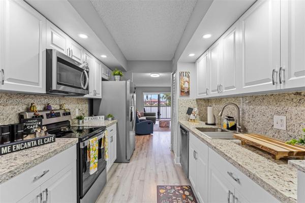 Ivanhoe At Century Village, 13355 SW 16th Ct #211E, Pembroke Pines, Florida 33027, image 1