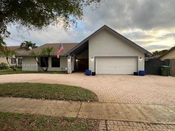 Woodbridge At Pembroke Lakes, 10140 NW 21st Ct, Pembroke Pines, Florida 33026, image 1