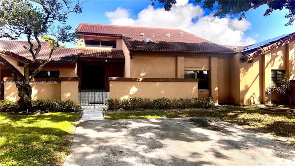 The Moors Townhouses, 6637 NW 178th Ter, Hialeah, Florida 33015, image 1