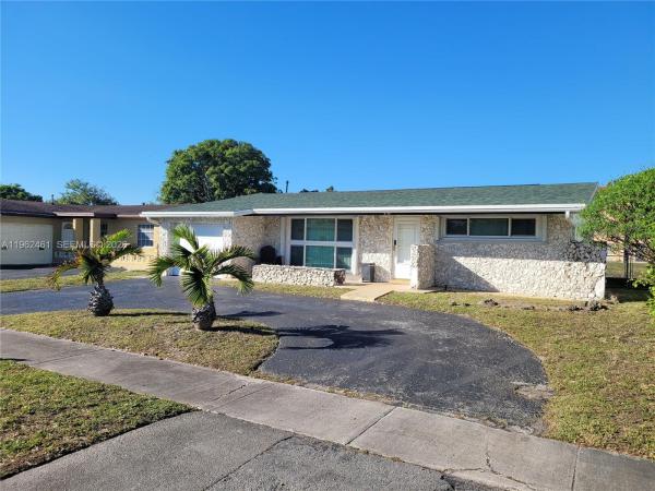 Sunrise Golf Village, 9161 NW 26th Pl, Sunrise, Florida 33322, image 1