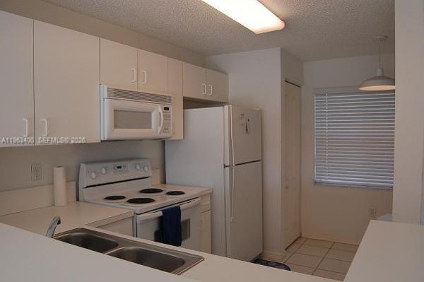 Bonita Villas, 14057 SW 121st Pl #7-24, Three Lakes, Florida 33186, image 2