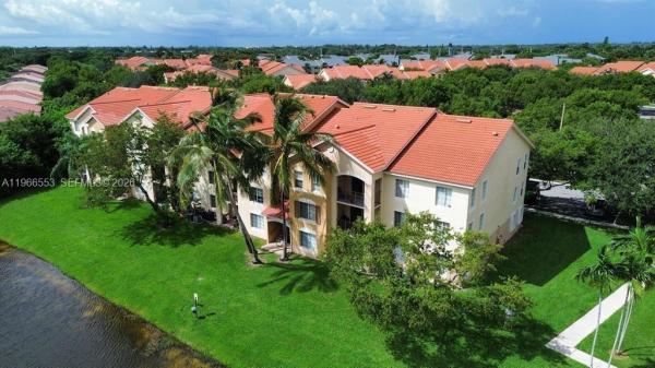 Emerald Isle At Laguna Lakes, 4180 San Marino Blvd #106, West Palm Beach, Florida 33409, image 1