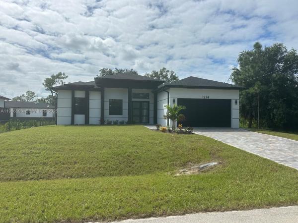 Lehigh Acres Residential, 1214 Cherry St E, Lehigh Acres, Florida 33974, image 1