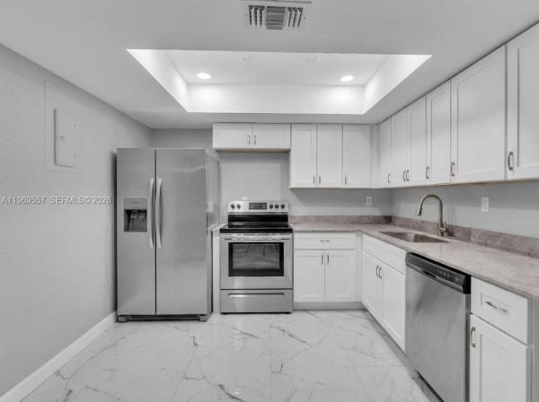 Shaker Village, 34 Meacham Ln, Tamarac, Florida 33319, image 1