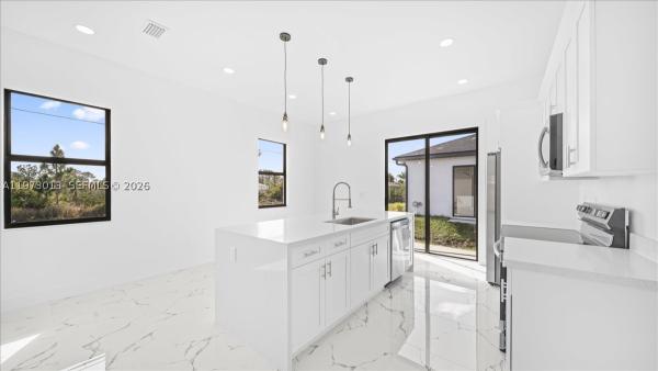 1143 Barfield St E, Lehigh Acres, Florida 33974, image 1