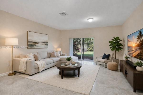 The Woodlands Villas, 4403 Woodland Cir, Tamarac, Florida 33319, image 1