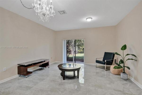 The Woodlands Villas, 4403 Woodland Cir, Tamarac, Florida 33319, image 2