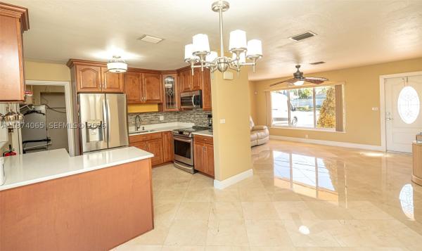 Heftler Homes, 4600 SW 104th Ave, Westwood Lakes, Florida 33165, image 2