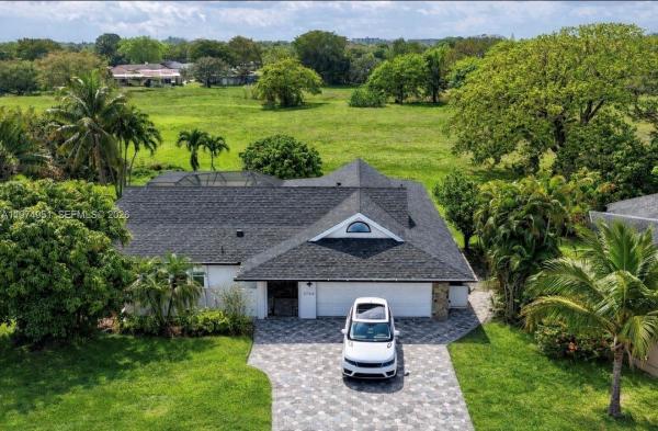 The Woodlands, 5706 Guava Dr, Tamarac, Florida 33319, image 1