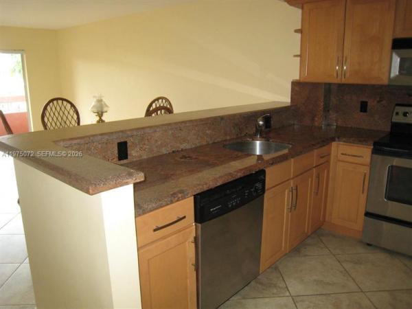Village Of Kings Creek, 7722 Camino Real #E-301, Glenvar Heights, Florida 33143, image 2