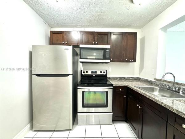 Montecarlo, 484 NW 165th Street Rd #A-411, Golden Glades, Florida 33169, image 2