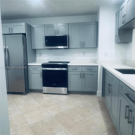 Townhomes Of Country Lake, 6618 NW 188th Ln, Country Club, Florida 33015, image 1