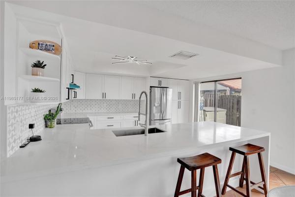 Village Homes At Lakes Of The Meadow, 15292 SW 46th Ln Br #64, Kendall West, Florida 33185, image 2