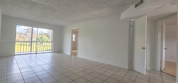 Versailles Gardens, 7911 N Colony Cir N #202, Tamarac, Florida 33321, image 1