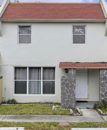 Tam O'Shanter Villas, 6593 Boulevard Of Champions, North Lauderdale, Florida 33068, image 1