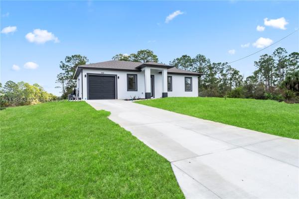 326 Louis Ave, Lehigh Acres, Florida 33936, image 1