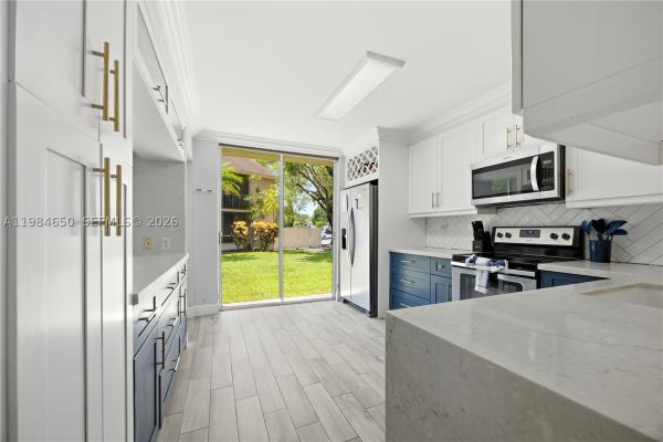 The Atrium At Woodmont, 7532 NW 86th Ter #104, Tamarac, Florida 33321, image 1