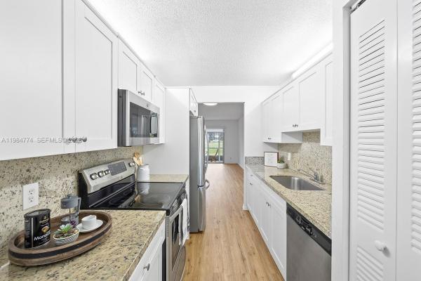 Cambridge At Century Village, 1401 SW 128th Ter #103H, Pembroke Pines, Florida 33027, image 1