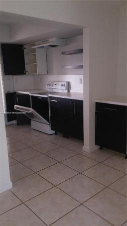 Sutton House, 11840 NE 19th Dr #27, North Miami, Florida 33181, image 2