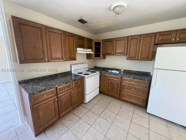 Magnolia, 1941 NW 152nd Ter, Miami Gardens, Florida 33054, image 2