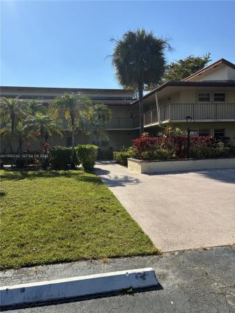 Holly Court At Woodmont, 8791 Holly Ct #103, Tamarac, Florida 33321, image 1