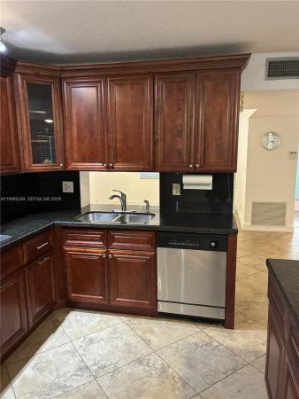 Holly Court At Woodmont, 8791 Holly Ct #103, Tamarac, Florida 33321, image 2