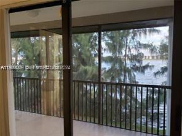 Carmel Lakes, 468 NE 206th Ln #107, Ives Estates, Florida 33179, image 1