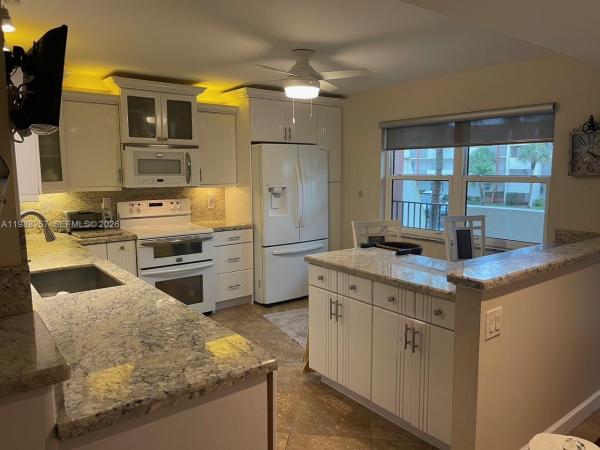 Hollybrook Golf & Tennis Club, 281 S Hollybrook Dr #50-205, Pembroke Pines, Florida 33025, image 1