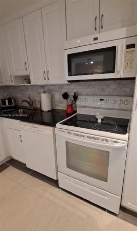 Las Vistas In Inverrary, 3774 Inverrary Blvd #103P, Lauderhill, Florida 33319, image 2