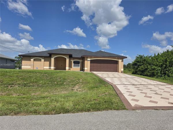 1816 Tomaso Ave, Lehigh Acres, Florida 33972, image 1