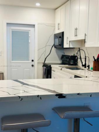 Biscayne Lawn, 1002 NE 119th St #F, Biscayne Park, Florida 33161, image 1