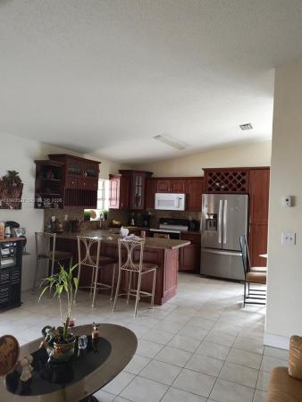 Munne Royal Homes, 14482 SW 97th St, The Hammocks, Florida 33186, image 1