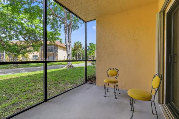 Villas At Carriage Hills Lakeside, 275 Gate Rd #104, Hollywood, Florida 33024, image 1