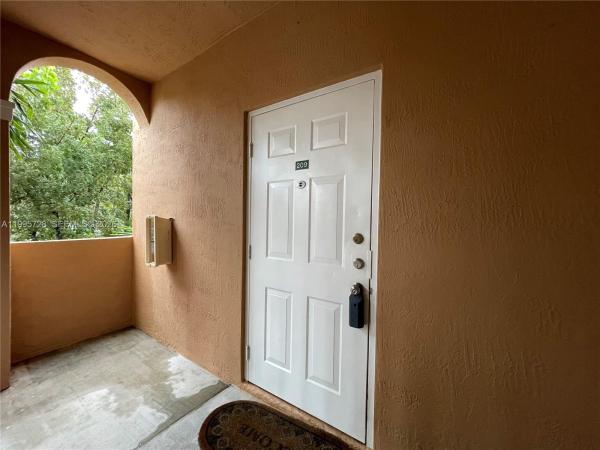 Shoma Homes At Country Club, 7080 NW 177th St #209-13, Hialeah, Florida 33015, image 1