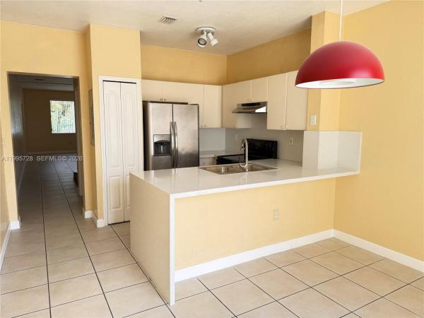 Shoma Homes At Country Club, 7080 NW 177th St #209-13, Hialeah, Florida 33015, image 2